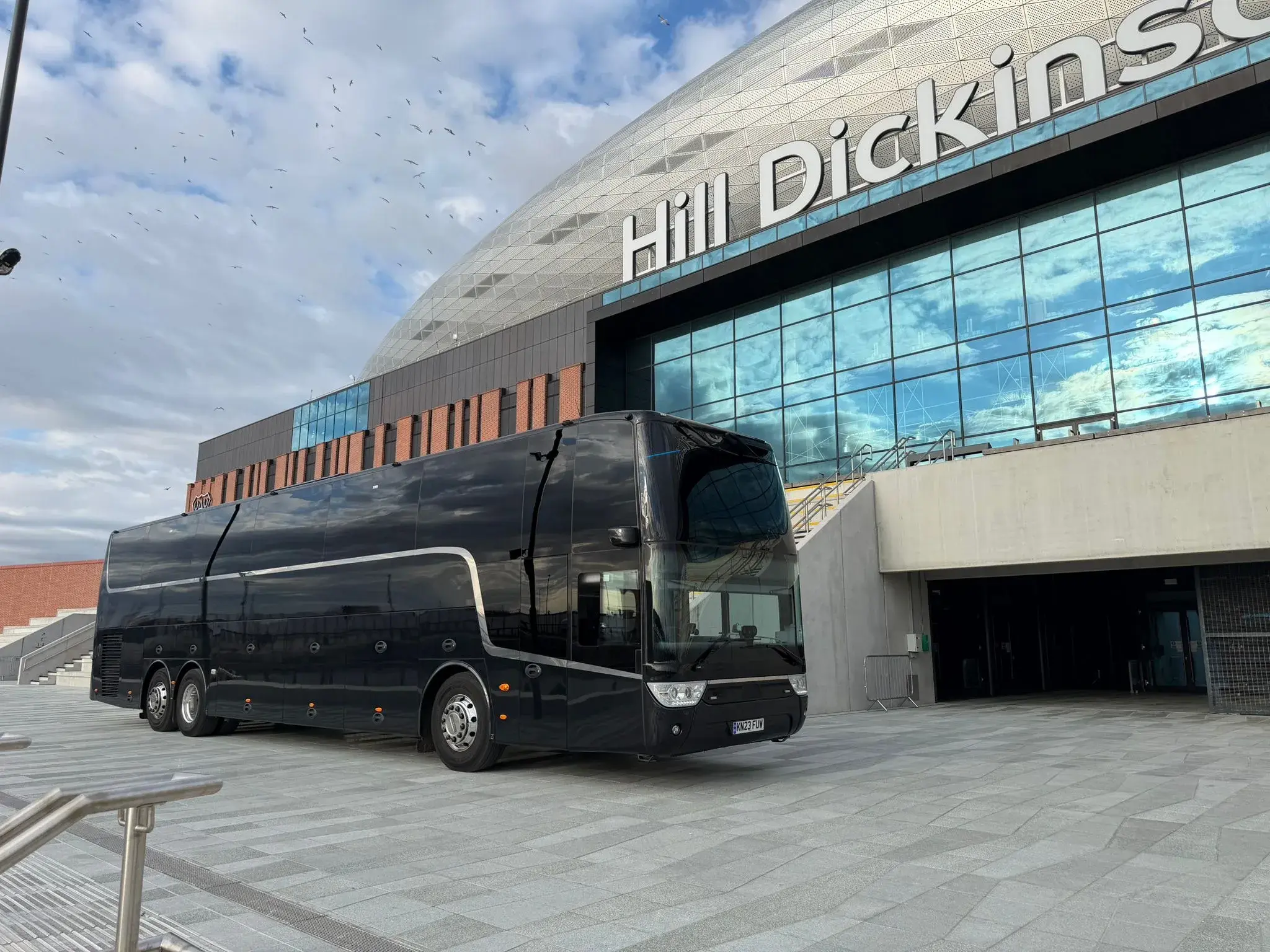 Coach outside Hill Dickinson stadium